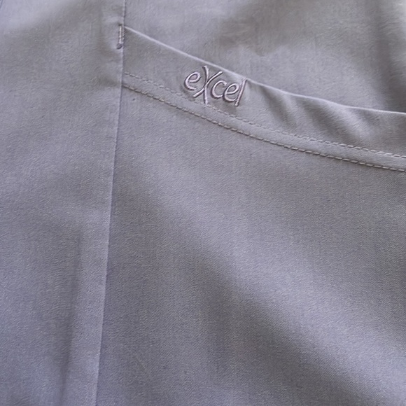 NWOT EXCEL scrub, xs. Stretchy fabric. - Picture 3 of 4